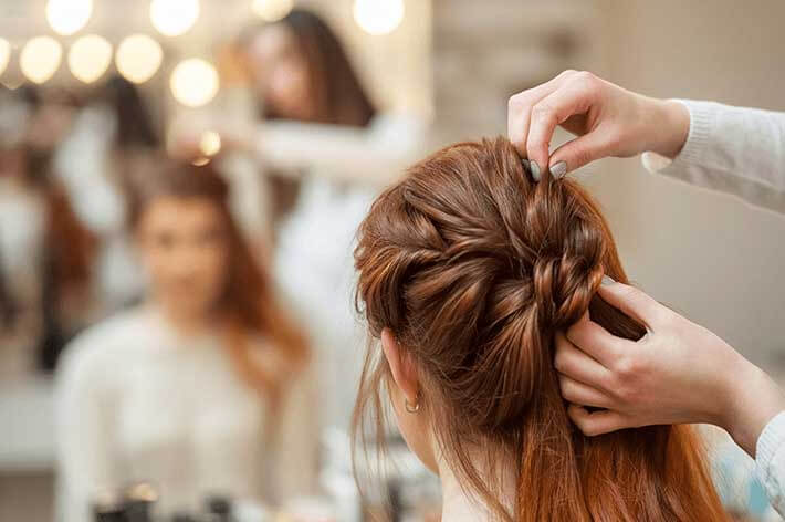 Hair stylist in salon