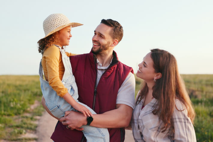 Happy family in field